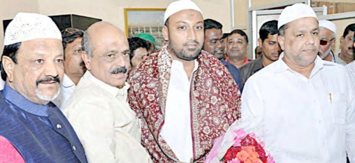 A K Khan greets Telangana State Haj Committee chairman