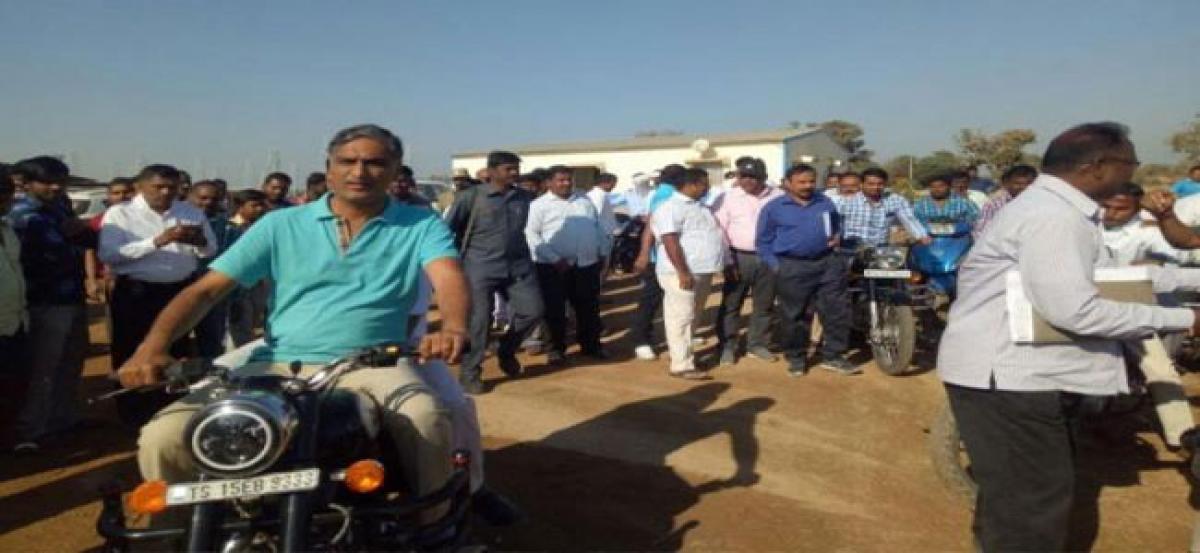 Harish Rao takes a bike ride to inspect irrigation project