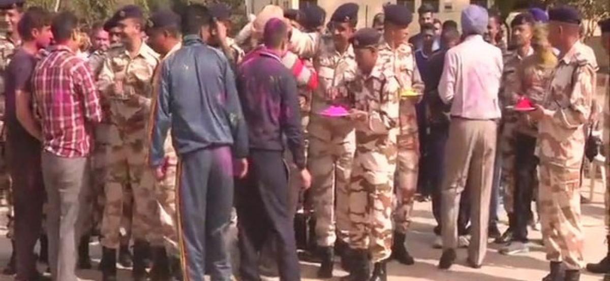 ITBP personnel draped in festive colour on Holi