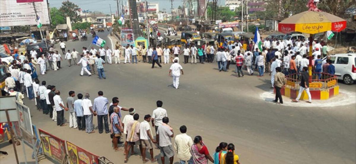 Human chain formed over Special Category Status