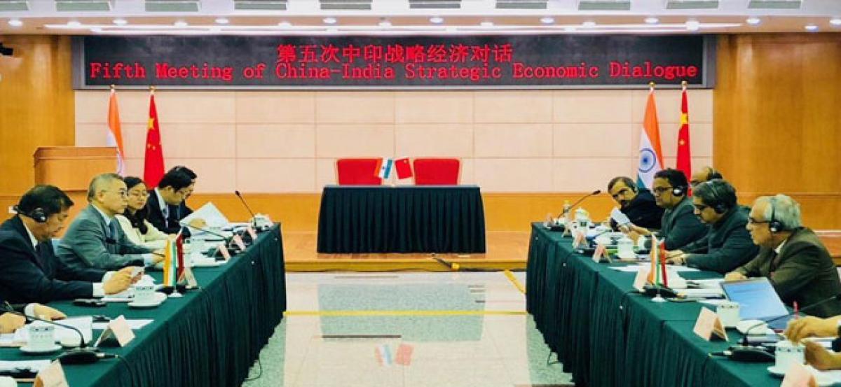 India says will not take sides in US-China trade spat