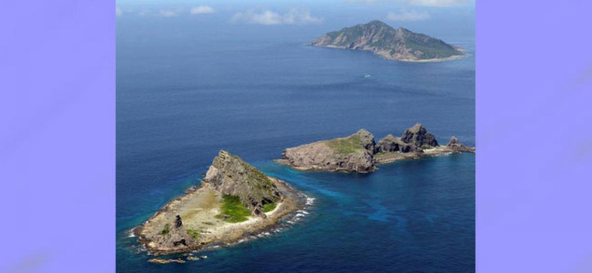 Japan protests to China over submarine near disputed islands