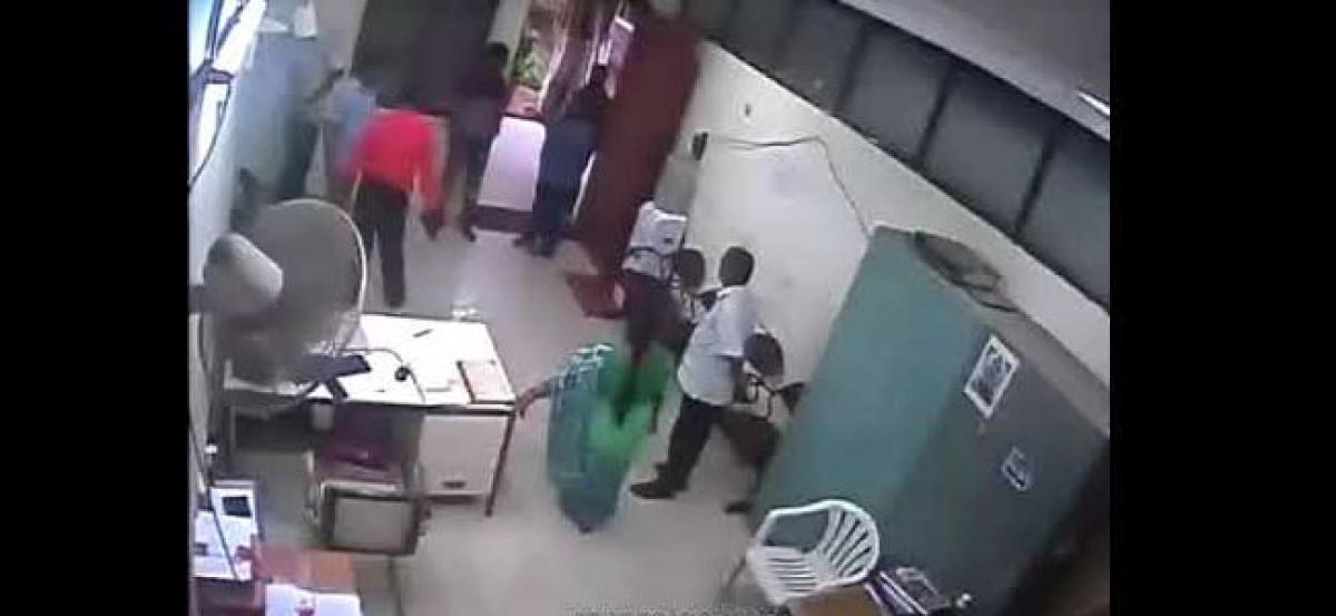 JNTU Professor  attacks security guard; video goes viral