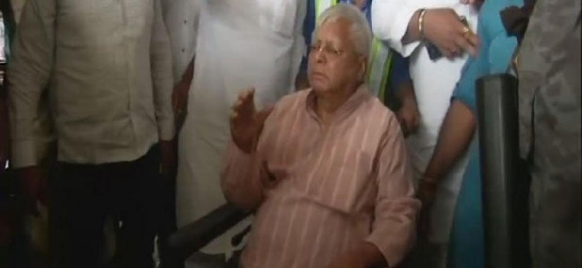 Lalu Prasad returns to Patna after treatment