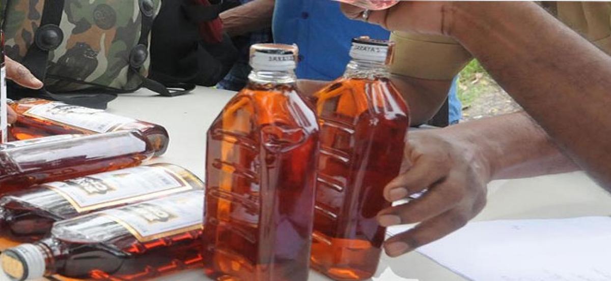 4 held for sale of illicit liquor