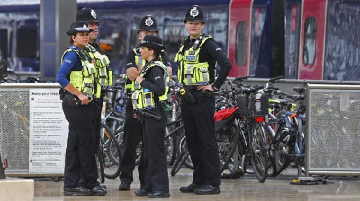 Britain lowers threat level after 2nd arrest in London Underground train attack