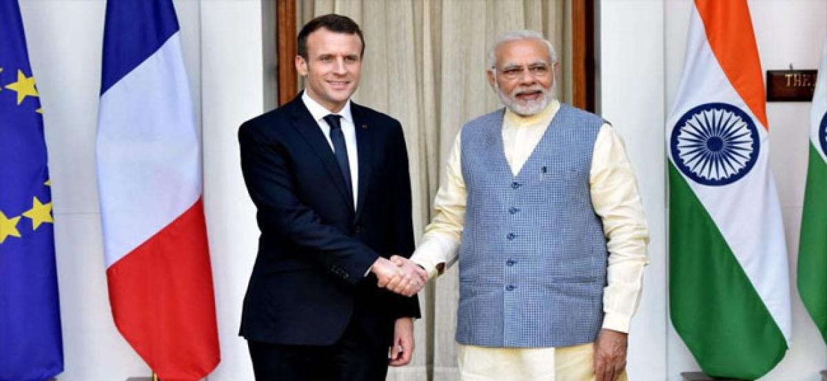 French president Macron takes a dig at Trump, hails efforts of India