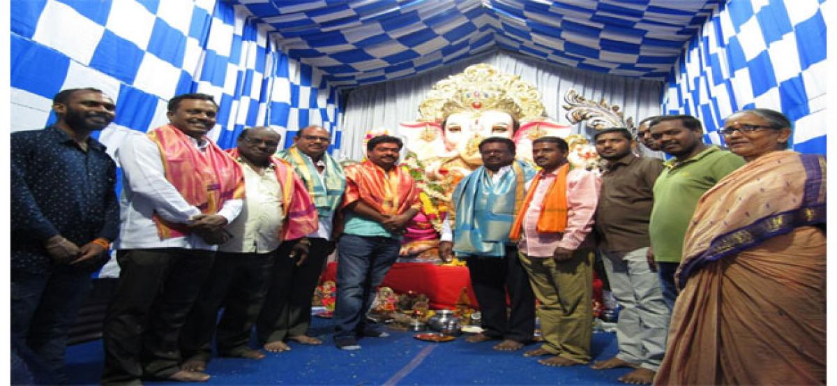 Pannala Devender Reddy performs puja at Ganesh pandals