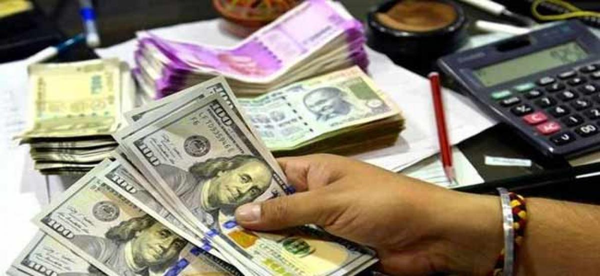 Rupee drops an inch at Mumbai foreign exchange market