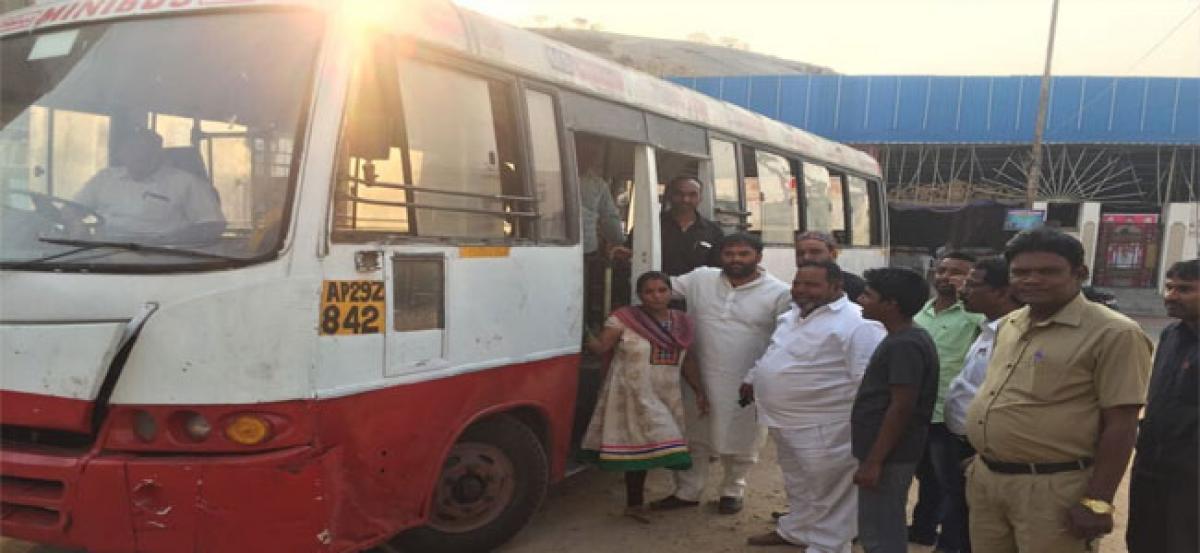 Mini buses at Moula Ali