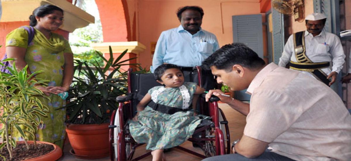 Wheel chair granted to needy child