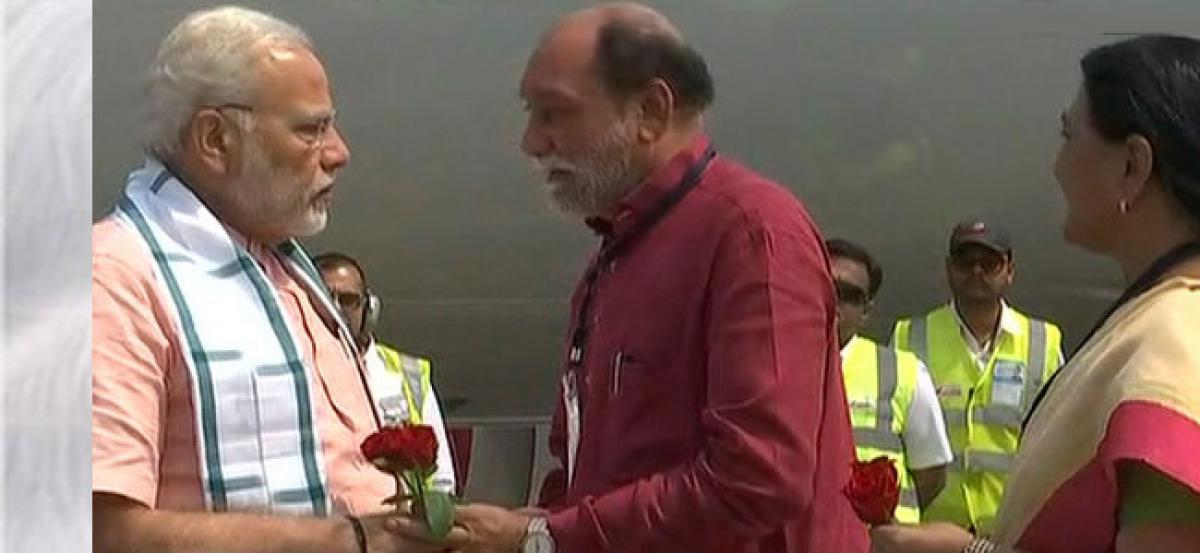 Prime Minister Narendra Modi reaches Surat