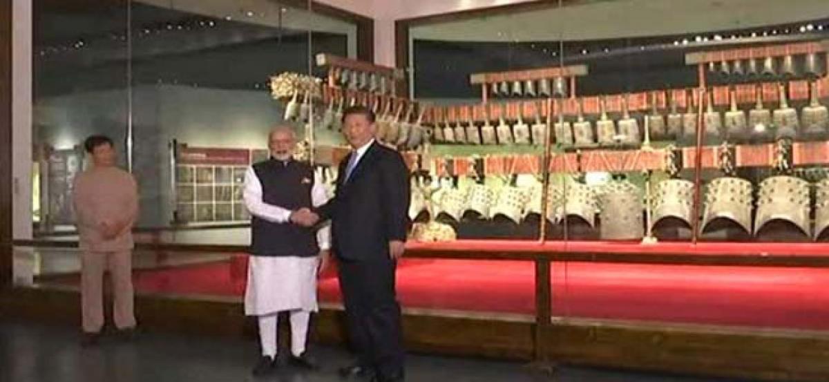 Xi takes PM Modi on museum tour ahead of informal summit