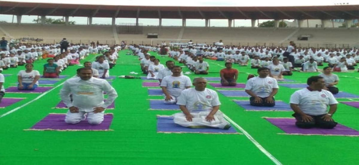 Ministers perform Yoga