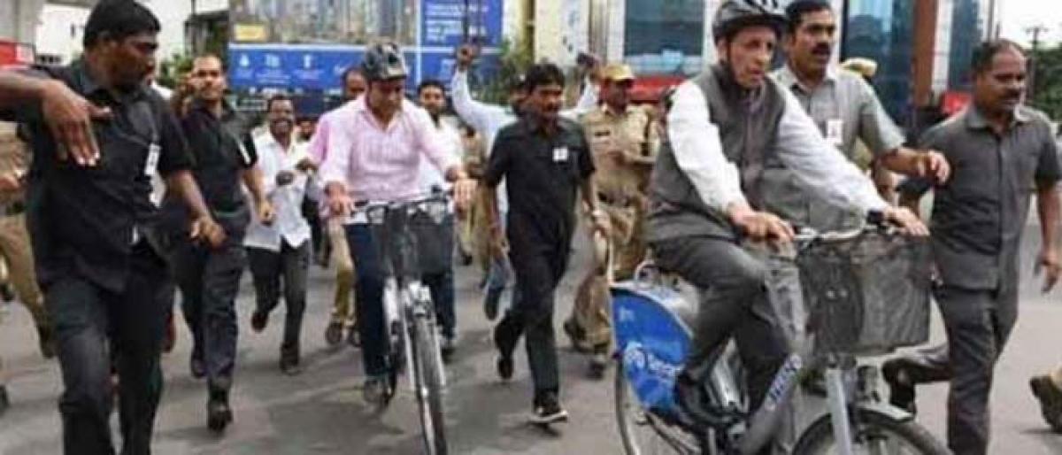 Telangana Governor ESL Narsimhan rides bicycle to Raj Bhavan