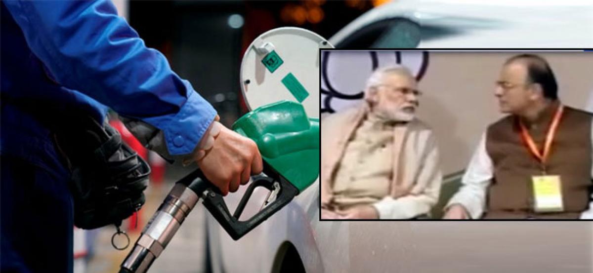 Petrol, diesel prices cut by Rs 2.50 after excise reduction; oil cos absorbing Re 1