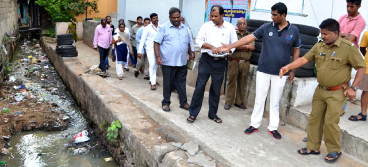 Close open drains with concrete slabs