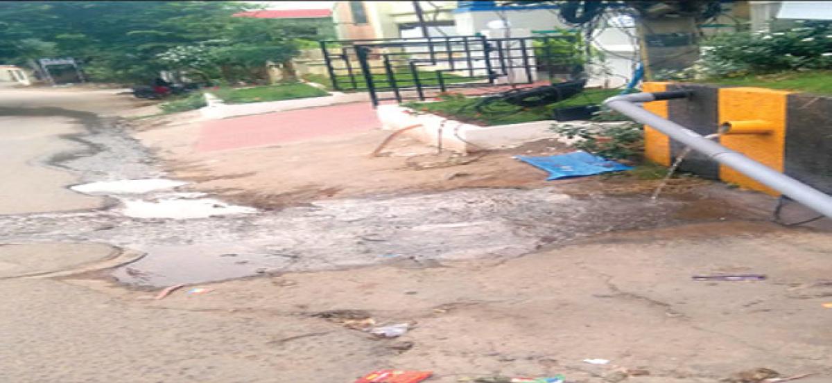 Hotel releases overhead tank overflow water on the road