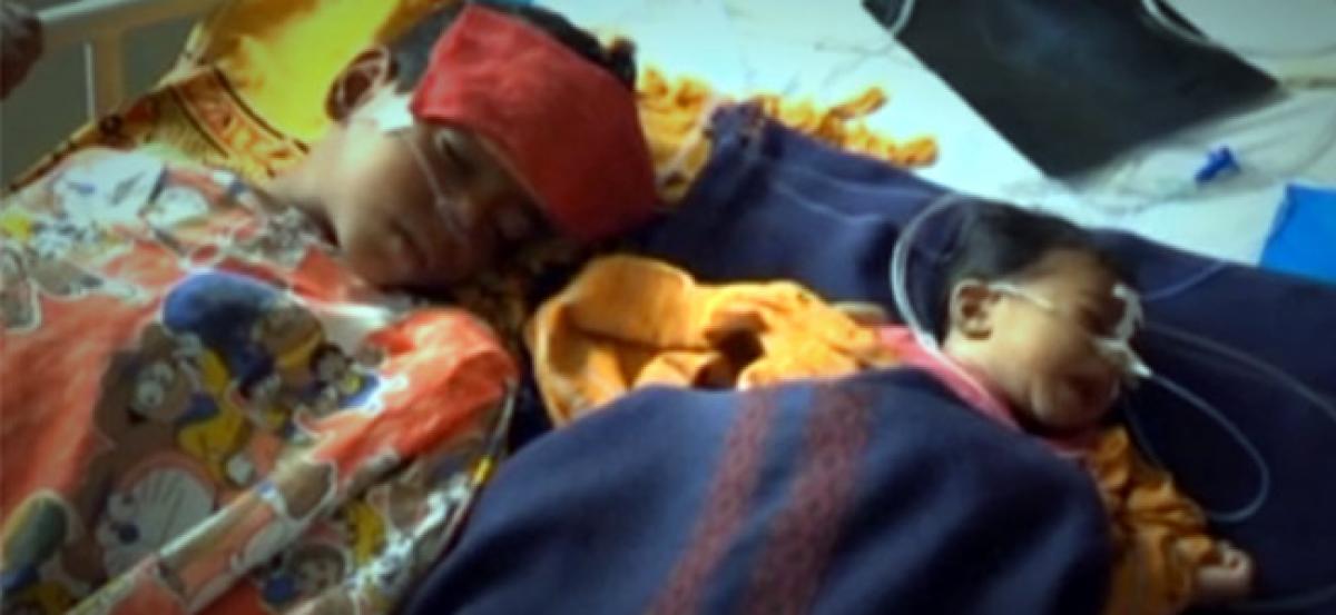 60 children die in Uttar Pradesh hospital amid furore over oxygen supplies