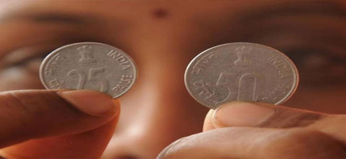 50 paise coin loses value in market