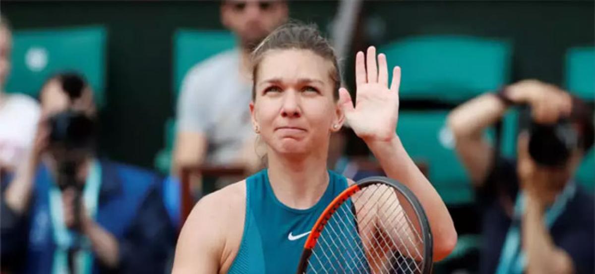 French Open: Halep rewarded for patience after risky start