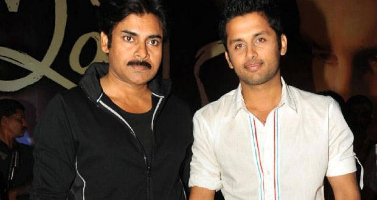 Pawan Kalyans photo frame on the wall in top hero house?