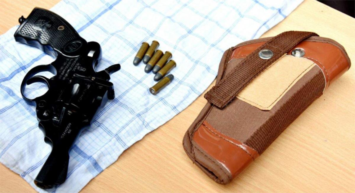 Pistol, bullets seized from Odisha devotee