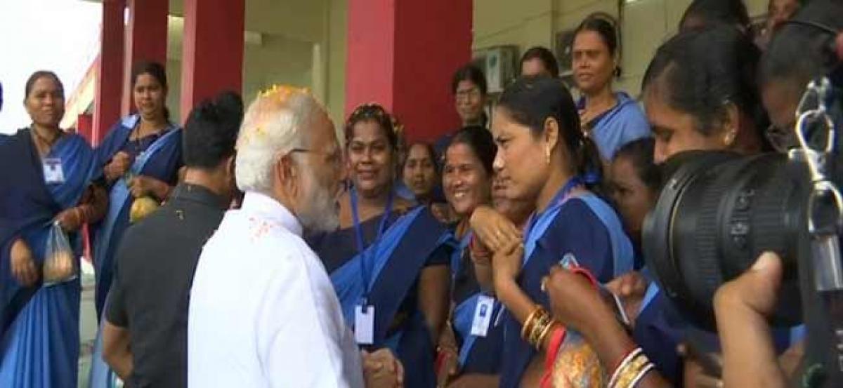 PM Modi arrives in Odisha, meets Anganwadi workers