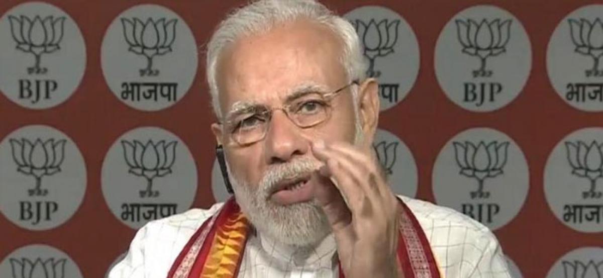 BJP promotes technology but some parties still oppose EVM, Aadhaar: PM Modi tells party workers