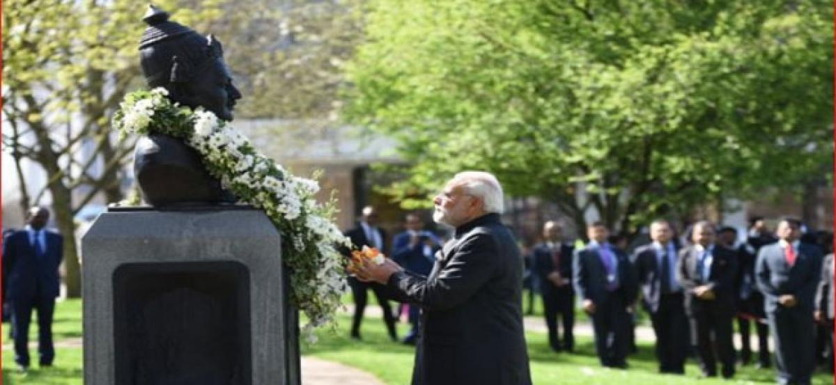 PM Narendra Modi pays floral tributes at Basaveshwara bust in London