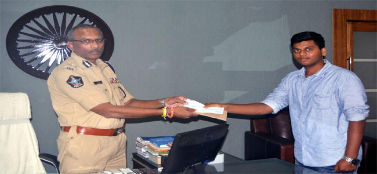 City police logo designer rewarded