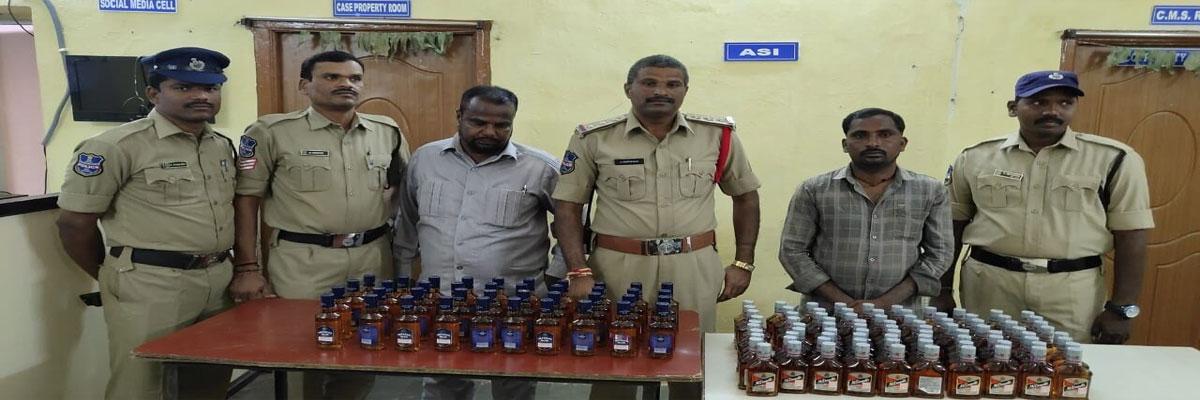 Police seize liquor bottles