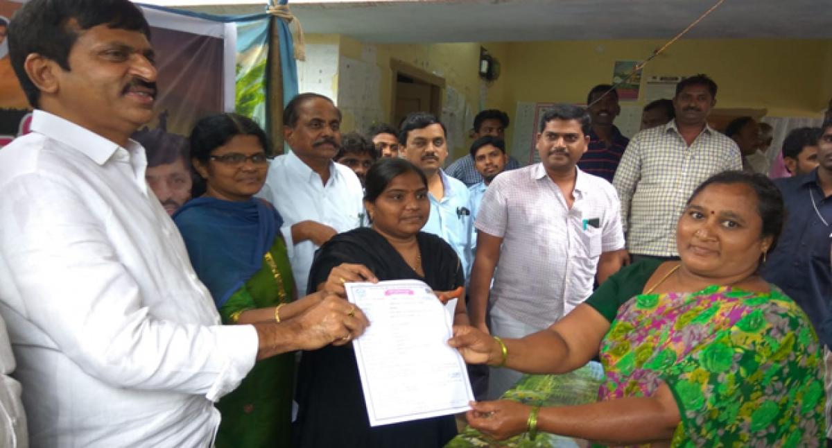 MP distributes Rythu Bima certificates among farmers