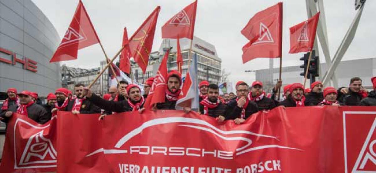 German industrial workers stage strikes to demand higher in wages