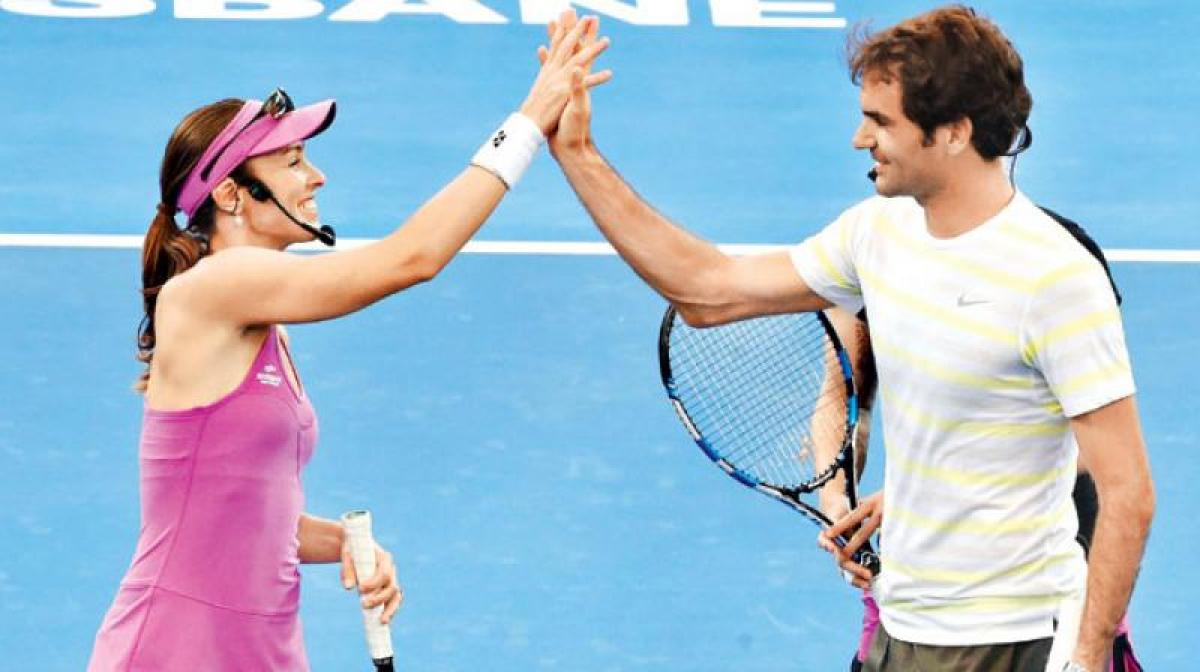 Roger Federer explains why he is not sad after Martina Hingis announced retirement