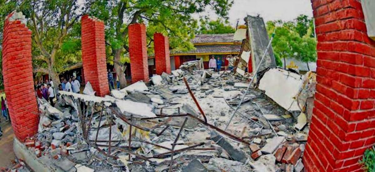 School roof collapse kills two students, leaves five others injured