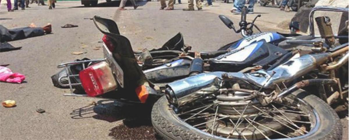 Three ryots killed as RTC bus hits bike 