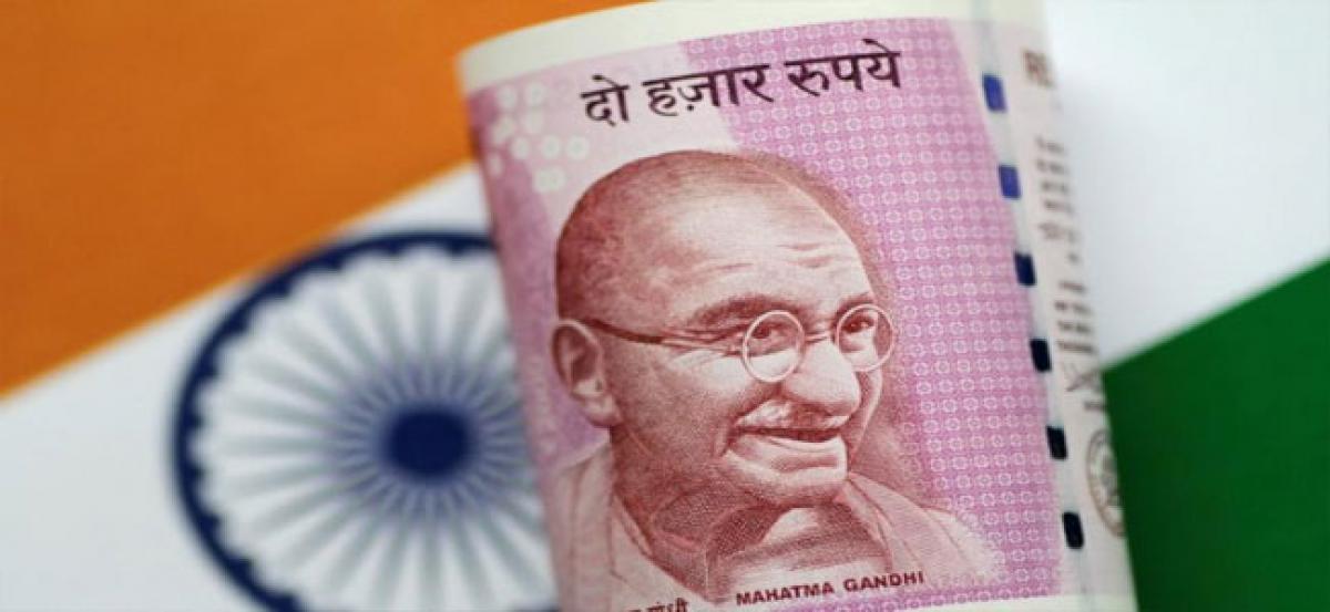Rupee continues to recover, gains 14 paise against US dollar