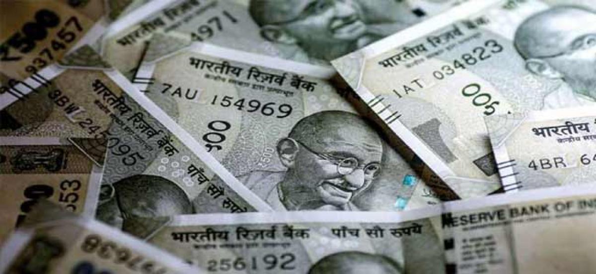 Rupee rises from record low, recovers 23 paise against US dollar