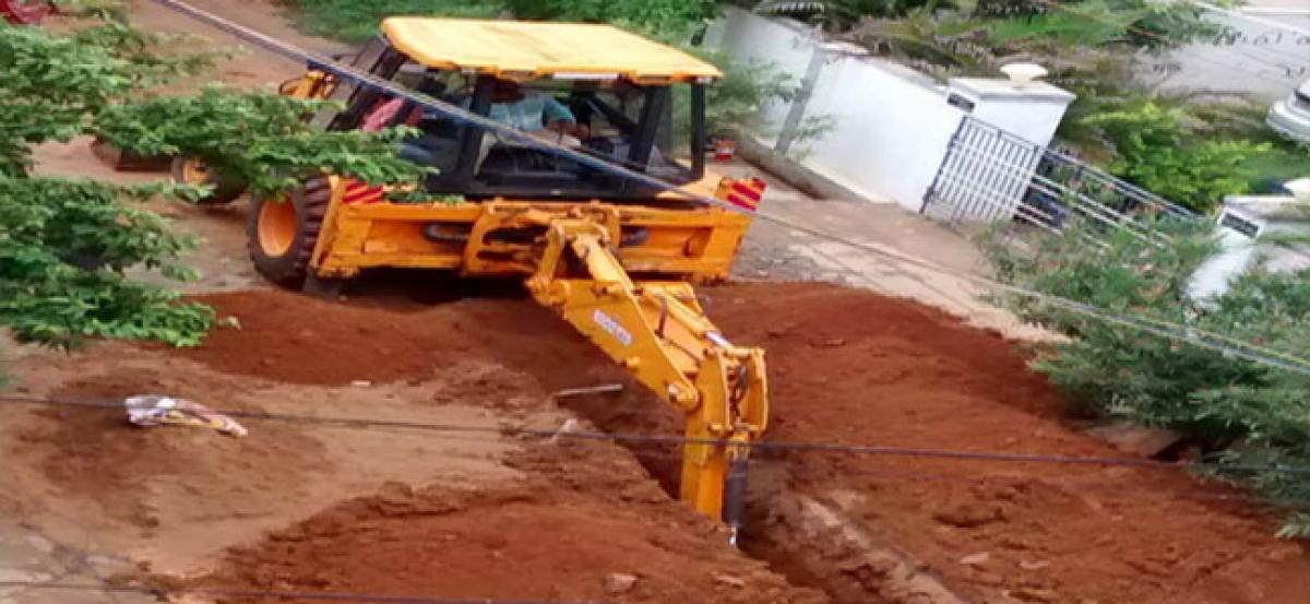 Drainage canal construction works damage city road