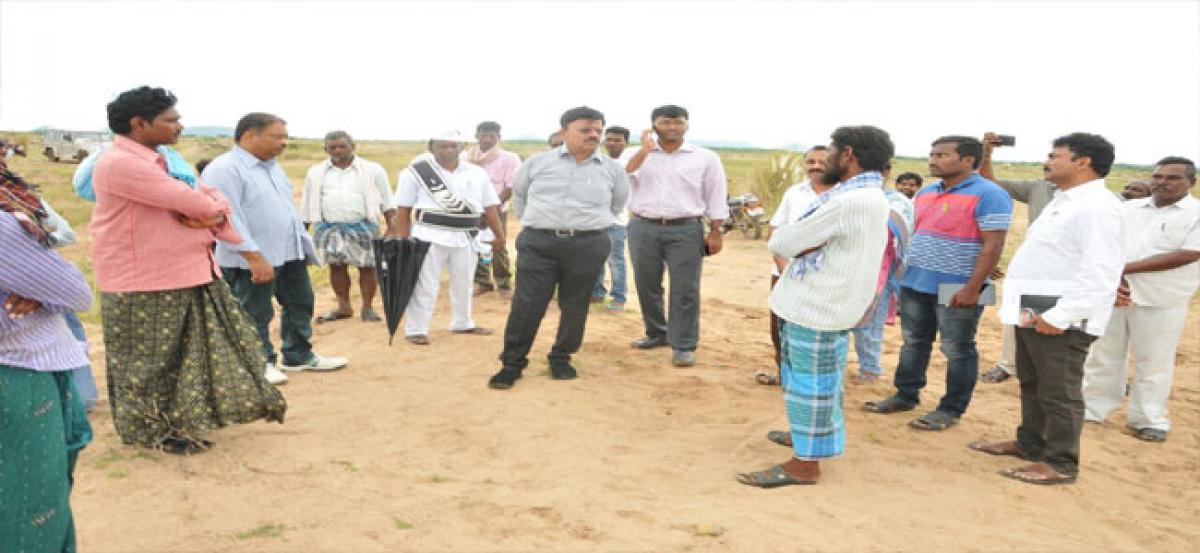 Collector inspects sand reach in Kanchikacharla mandal