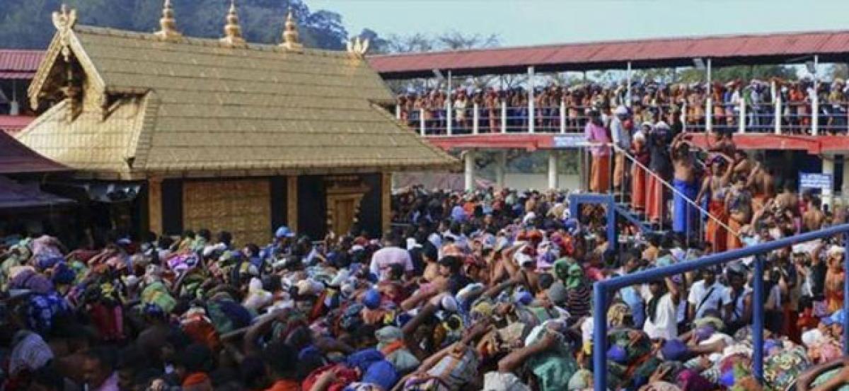 SC refers Sabarimala temples ban on women to Constitution Bench