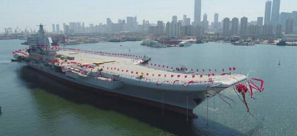 China’s first home-built aircraft carrier begins sea trials