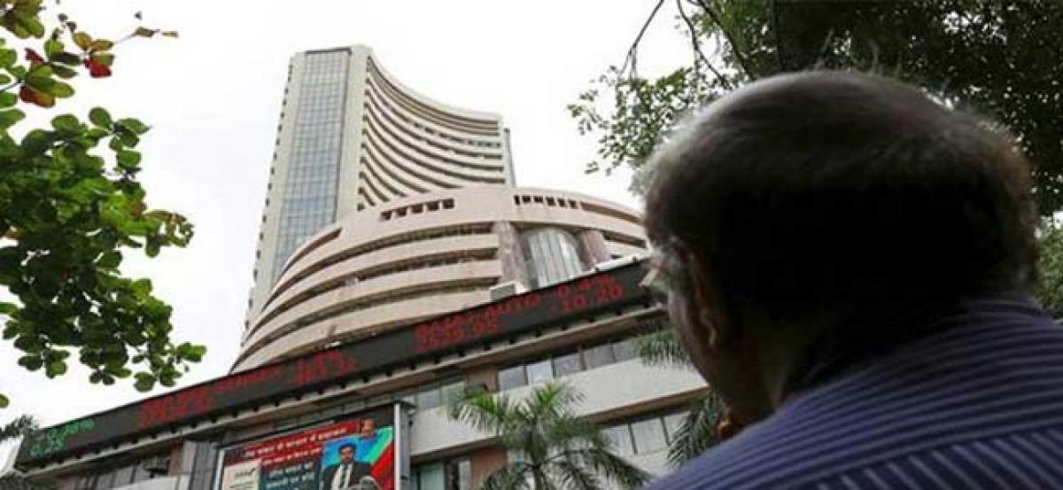 Market indices trade positive owing to favourable global cues