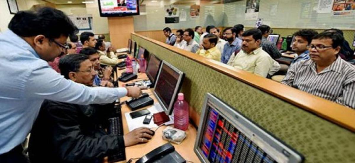 Sensex ends lower in cautious trade