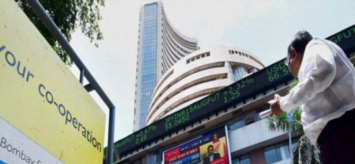 Sensex slips from record on profit-booking