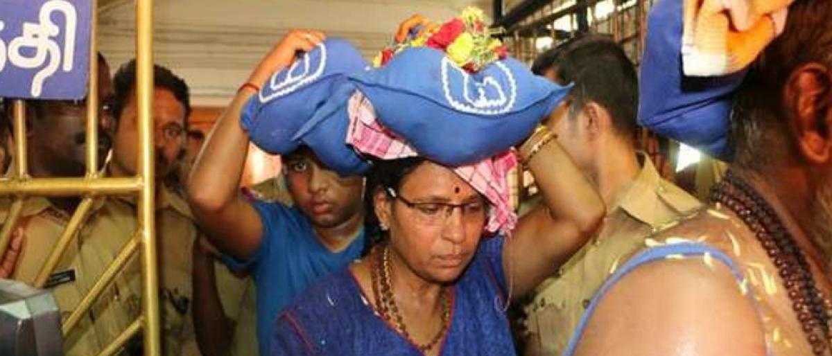 Devotees allow woman of 52 at Sabarimala