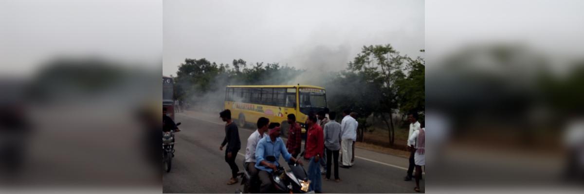 Fumes broke out from a moving private school bus in Shadnagar