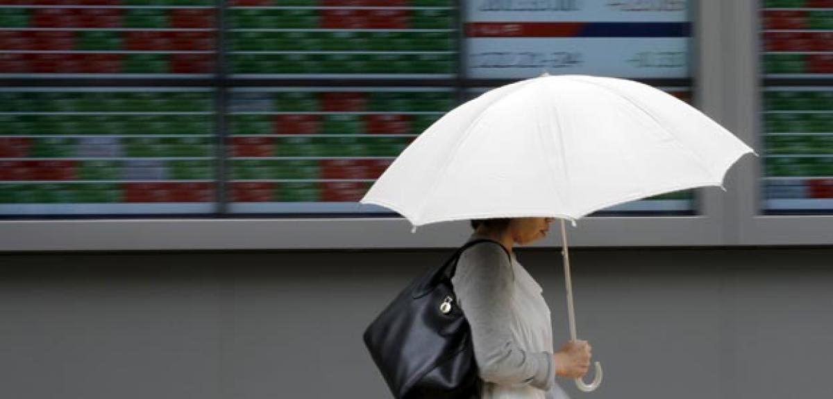 Asian shares conquer 10-year peak, oil up on Iraq tensions