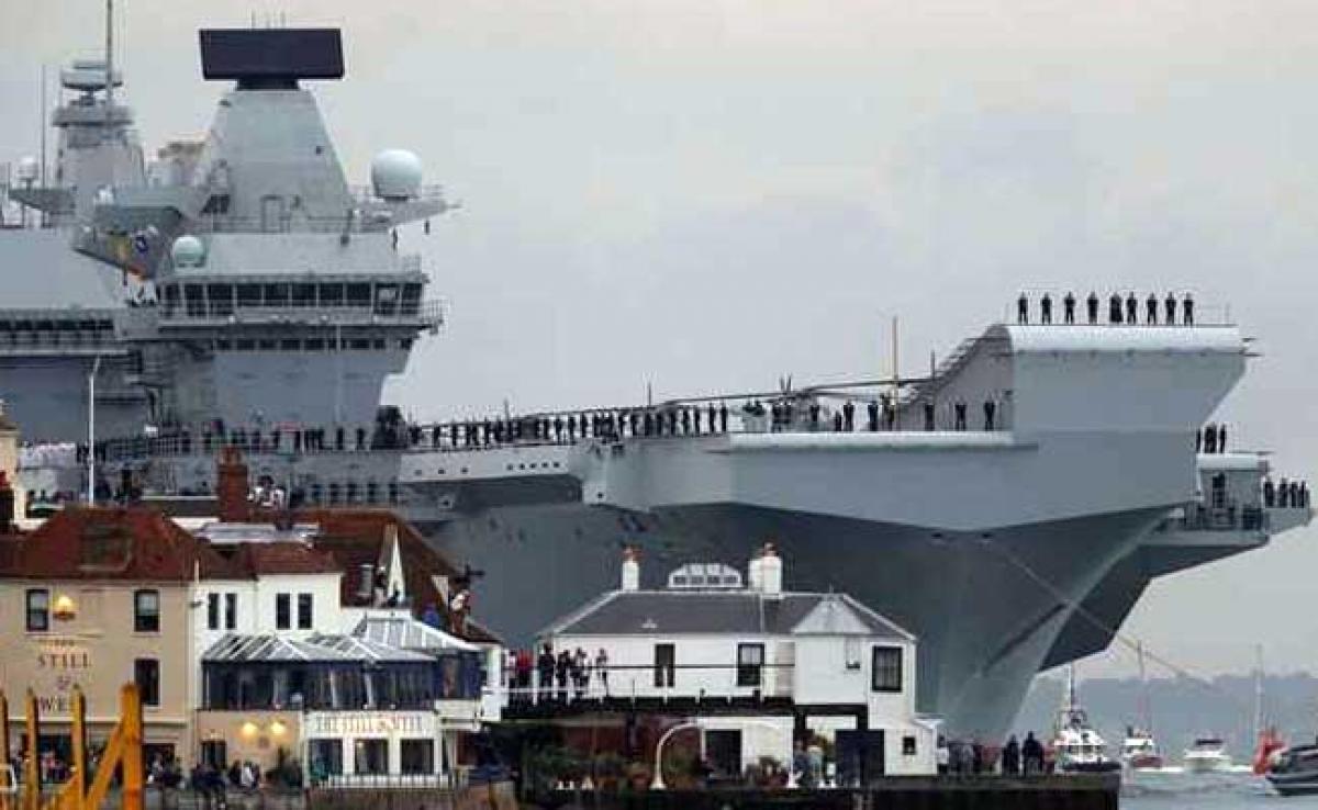 UKs Biggest Warship HMS Queen Elizabeth Sails Into Home Port For First Time